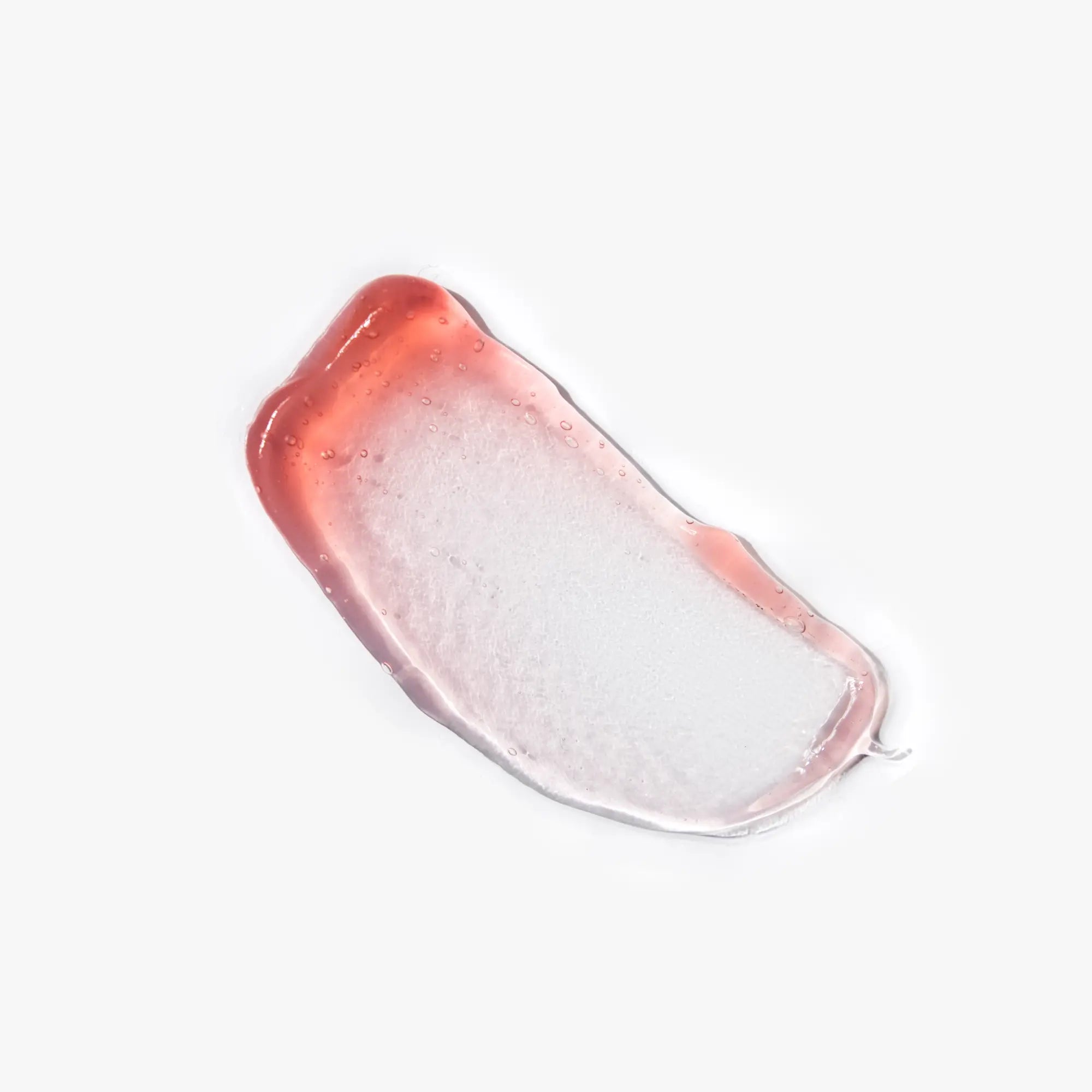 texture masque exfoliant rose fond blanc
