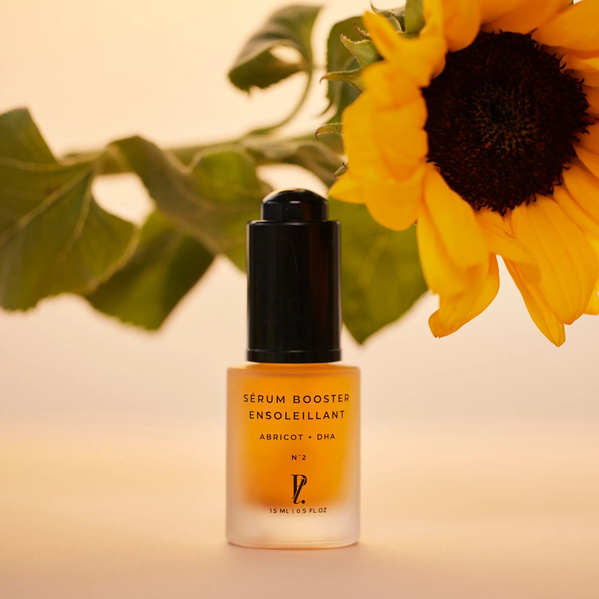 sérum ensoleillant fond orange et tournesol