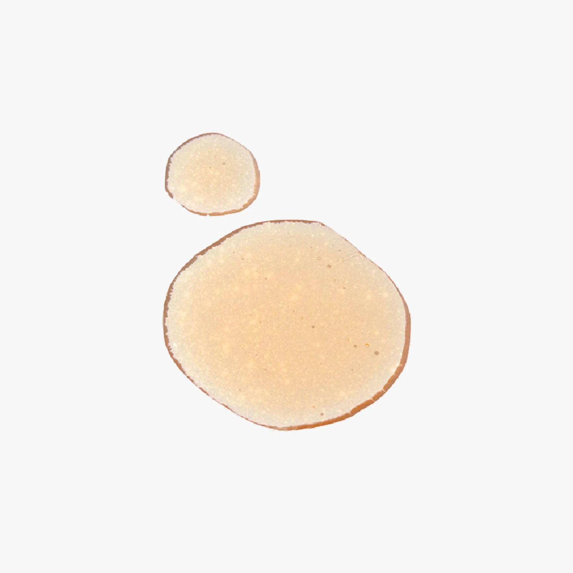 texture sérum orange fond blanc